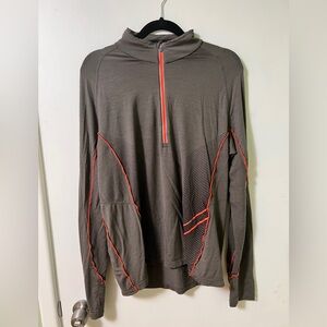 Icebreaker merino base layer.  96% wool 4% elastane. 1/4 zip.